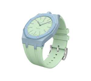 Relógio Swatch x Audemars Piguet Bioceramic Royal Pop 'Blaue Acht' Verde / Azul com Pulseira – relógio montado no case com pulseira em borracha, vista 3/4
